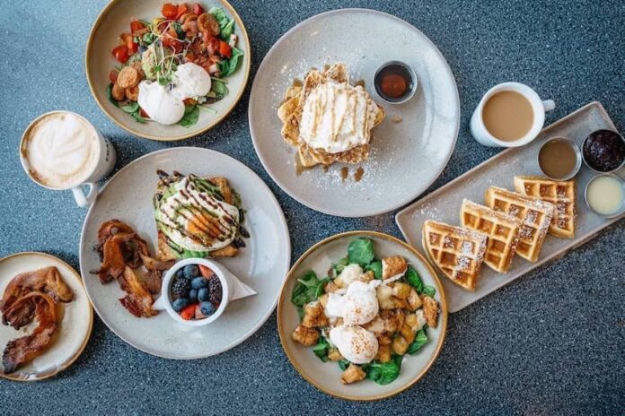 Dishes of different brunch items on a table