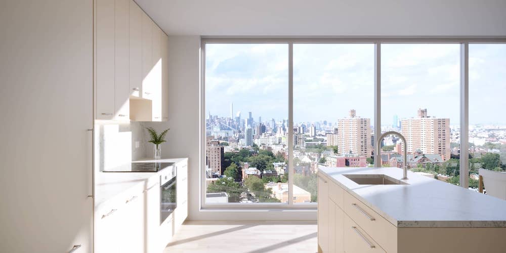 Kitchen with kitchen island and floor-to-ceiling windows