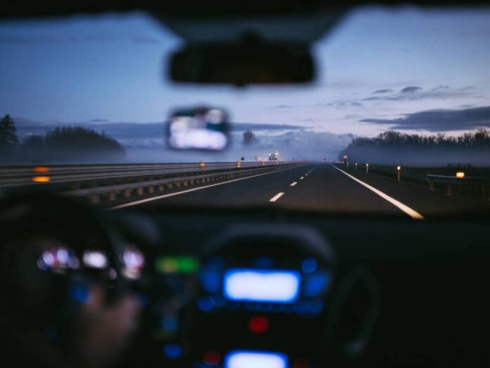 A view of the highway from the car dashboard