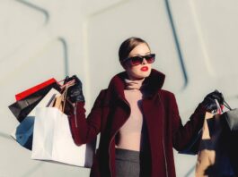 Woman holding multiple shopping bags