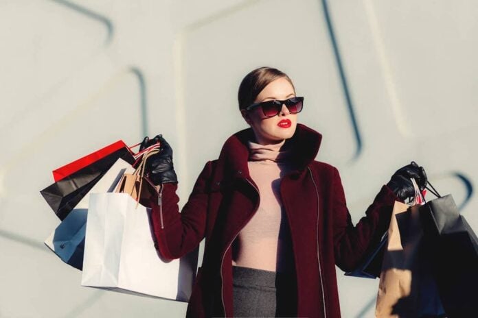 Woman holding multiple shopping bags