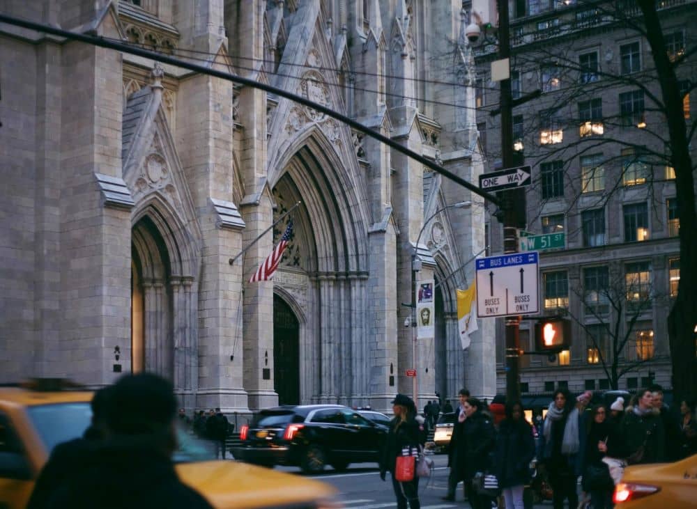 St. Patrick's Cathedral with traffic and pedestrians