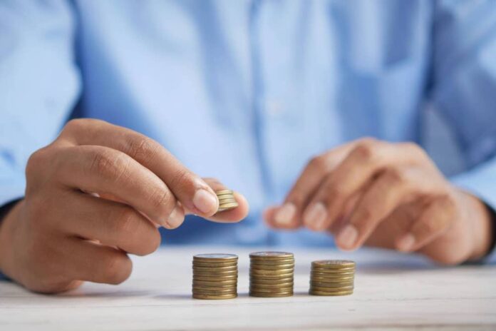 Man counting coins